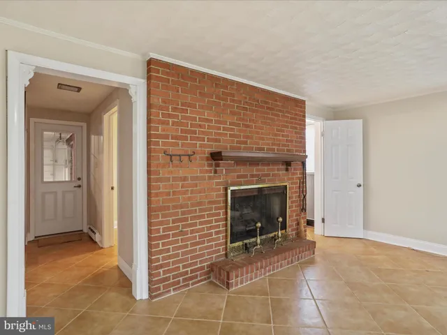 a view of a livingroom with a fireplace