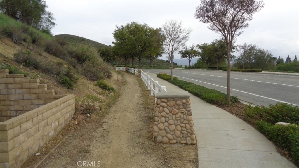 9516 Ca-118 Simi Valley Simi Valley, CA 93063 - Photo 2 of 9 a view of a road with a yard