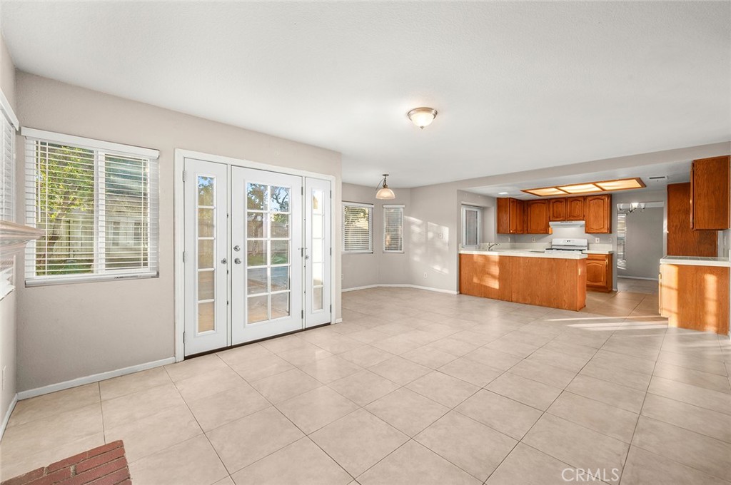 31348 Huron Street Temecula, CA 92592 - Photo 17 of 46 a view of a big room with windows and a kitchen