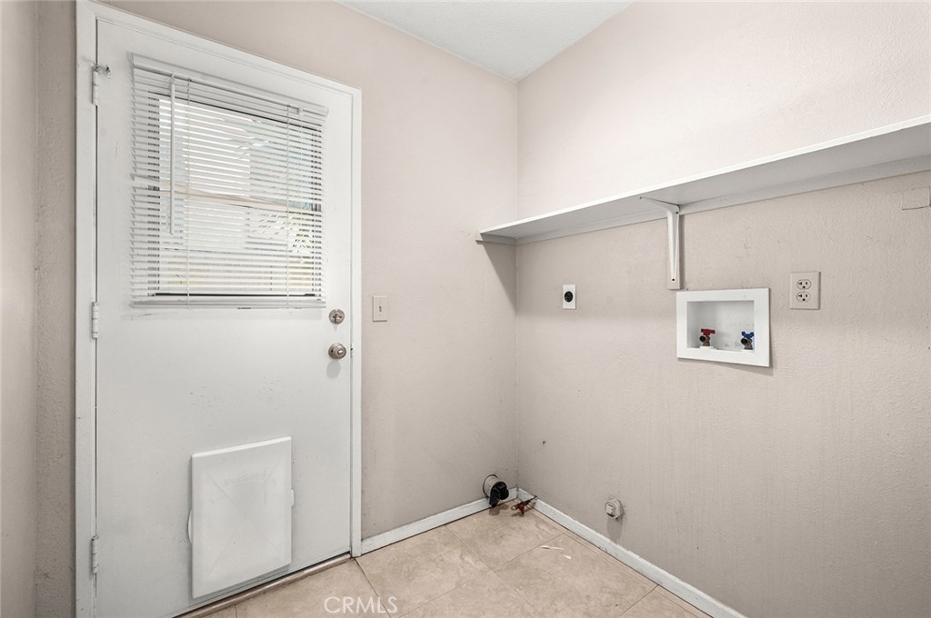 31348 Huron Street Temecula, CA 92592 - Photo 19 of 46 a view of a storage & utility room with a window
