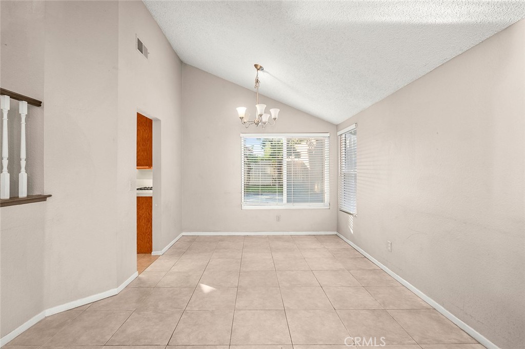 31348 Huron Street Temecula, CA 92592 - Photo 8 of 46 a view of an empty room with a window