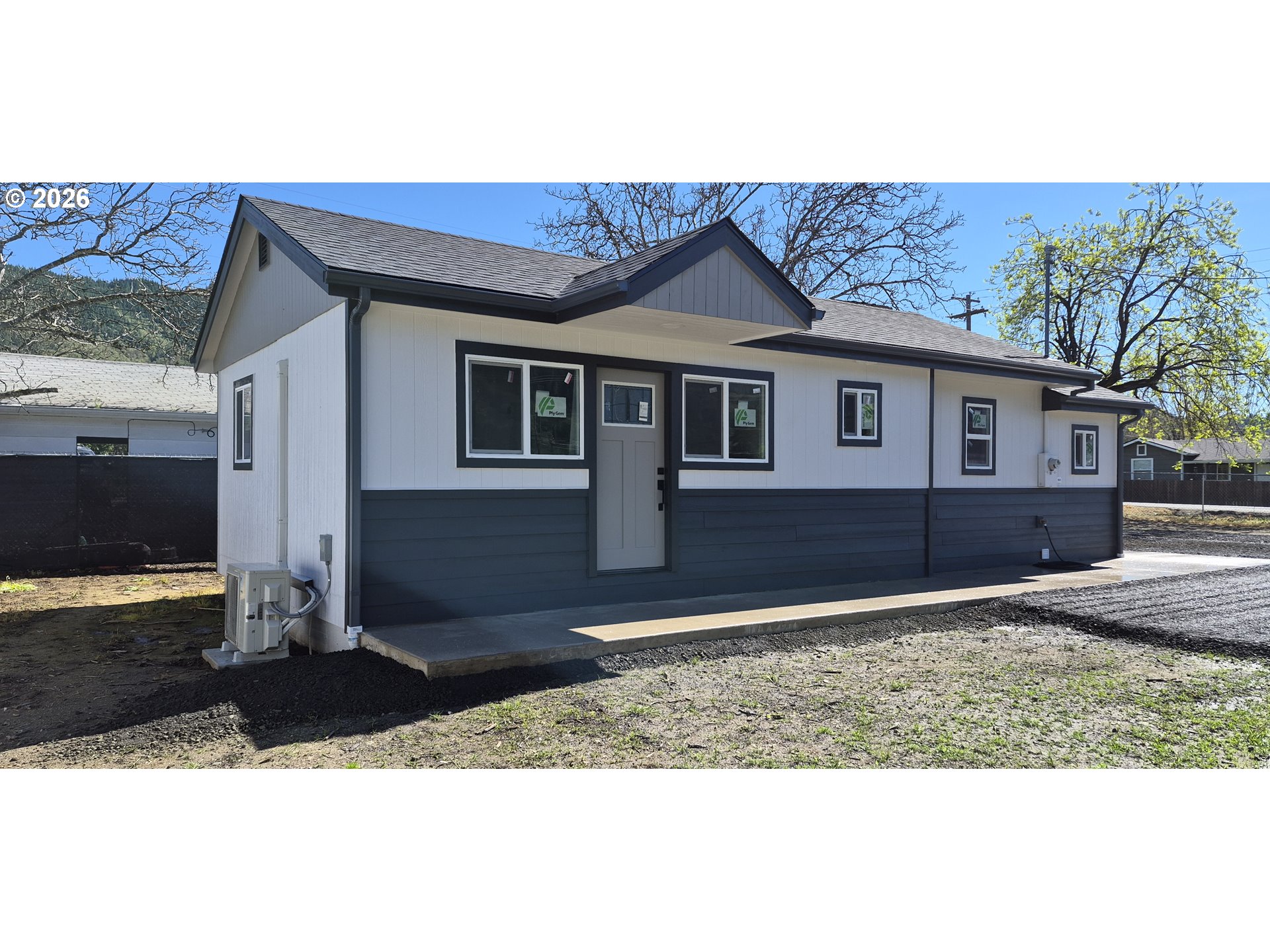 a front view of a house with yard