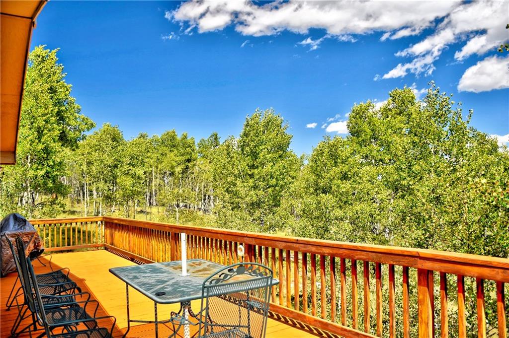 293 Old Squaw Road Como, CO 80432 - Photo 10 of 21 a view of a balcony with chairs