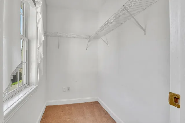 a view of small space with racks on the wall