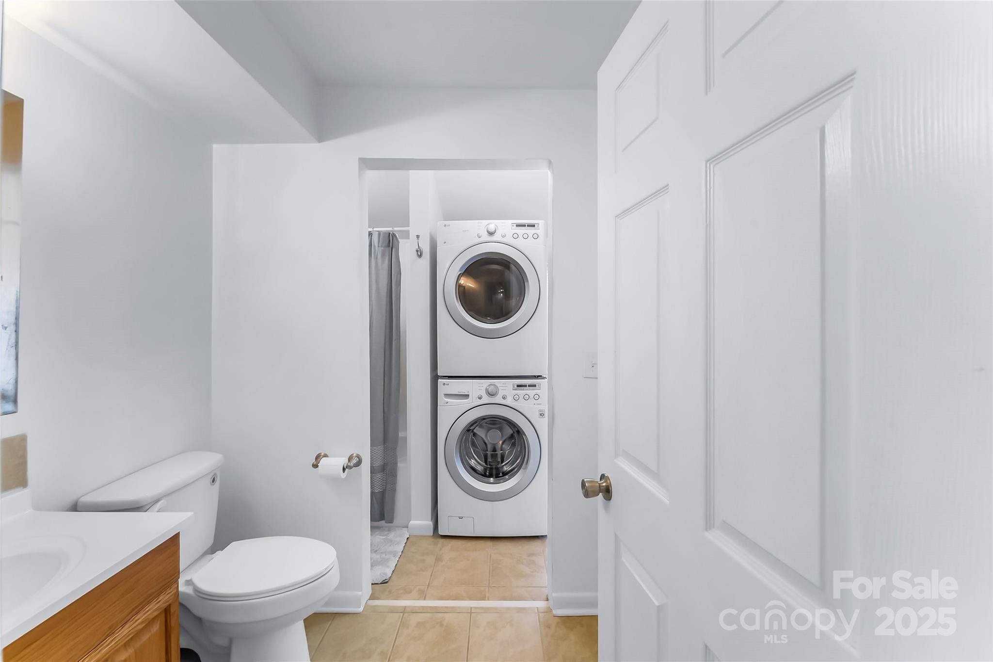 601 West 2nd Street Cherryville, NC 28021 - Photo 13 of 19 a utility room with sink dryer and washer