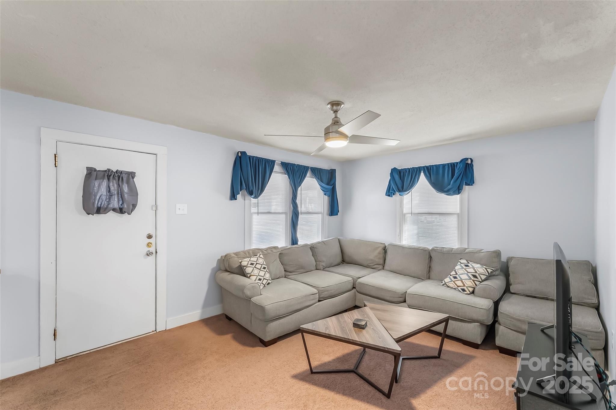 601 West 2nd Street Cherryville, NC 28021 - Photo 5 of 19 a living room with furniture and a large window