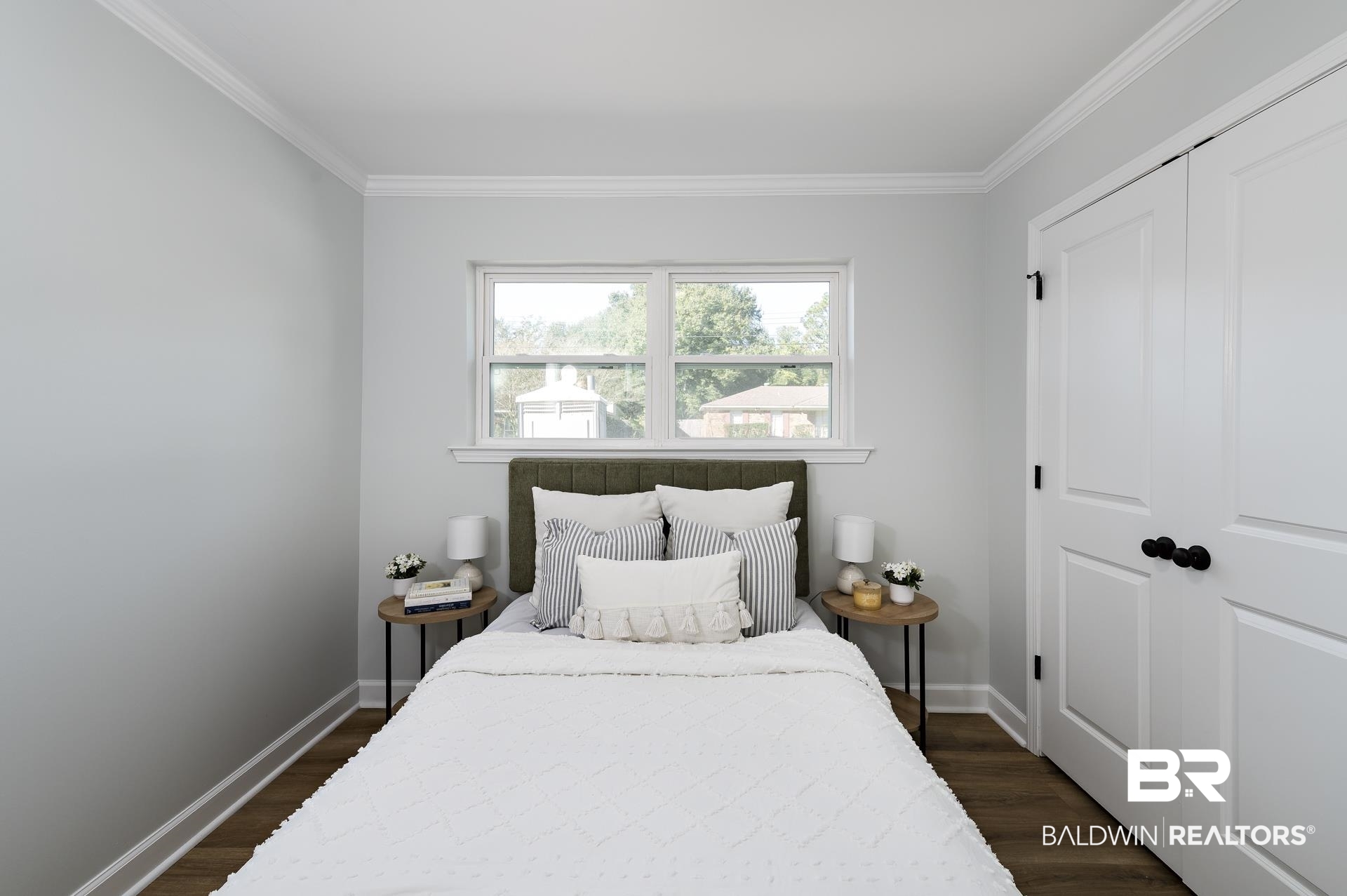6001 Camp Halls Mill Road Mobile, AL 36619 - Photo 31 of 52 Bedroom featuring dark wood finished floors, crown molding, and a closet