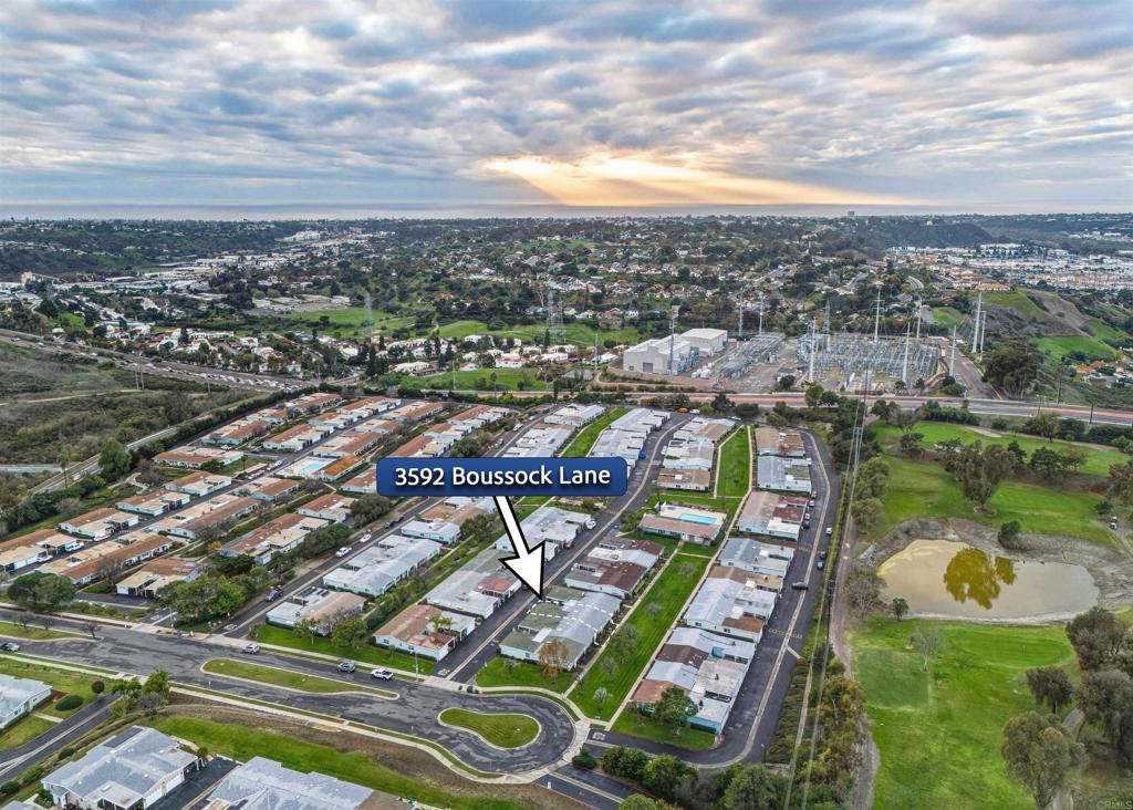 3592 Boussock Lane Oceanside, CA 92057 - Photo 22 of 24 an aerial view of a city with lots of residential buildings