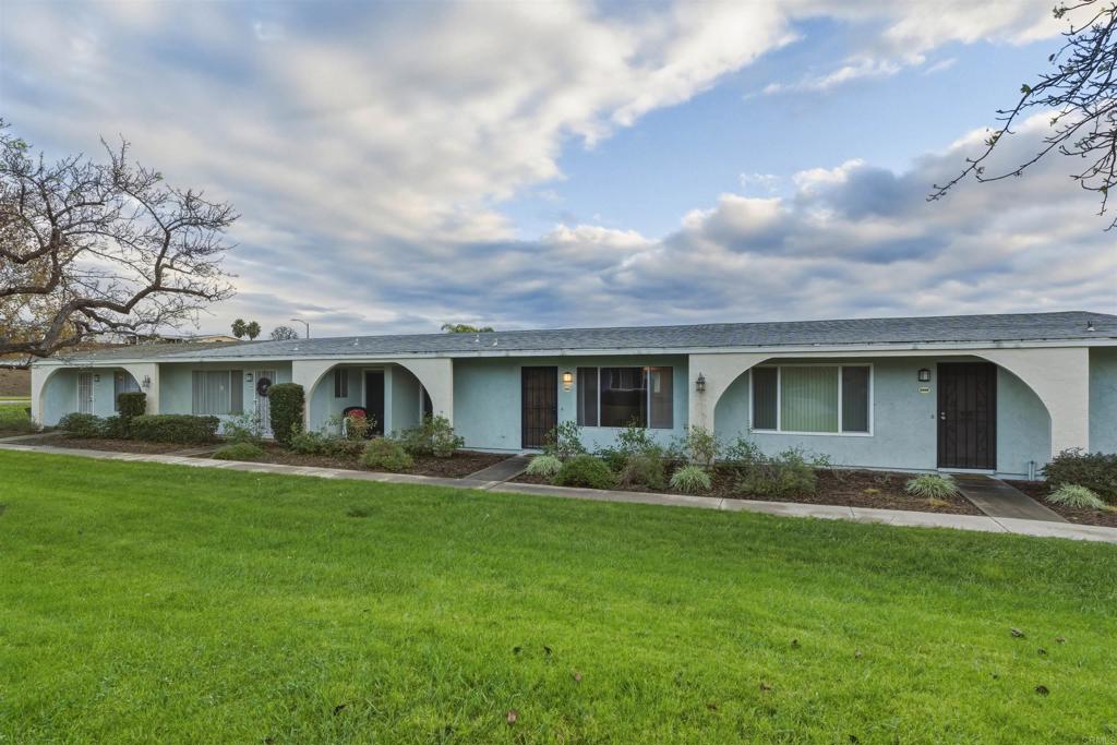 3592 Boussock Lane Oceanside, CA 92057 - Photo 3 of 24 a front view of house with yard and green space