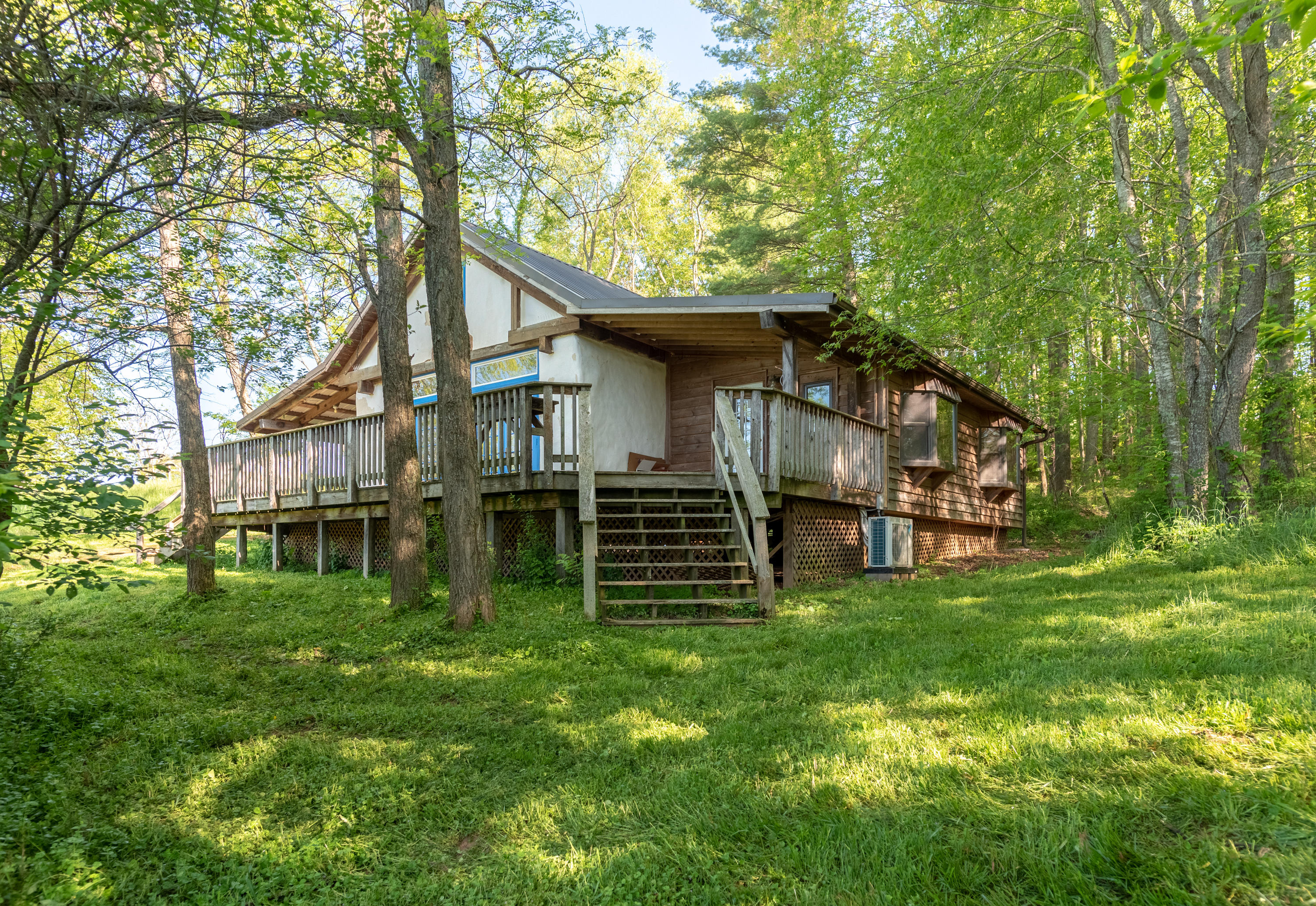 483 Eanes Road Northeast Check, VA 24072 - Photo 2 of 31 a house that has tree in front of it