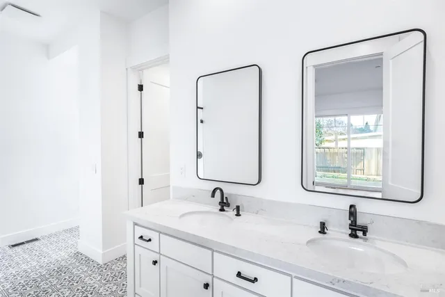 a view of kitchen and empty room