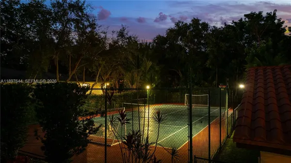 a bathroom with a tub and a shower
