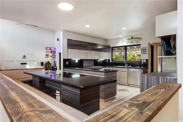 a group of people sitting outside of a building