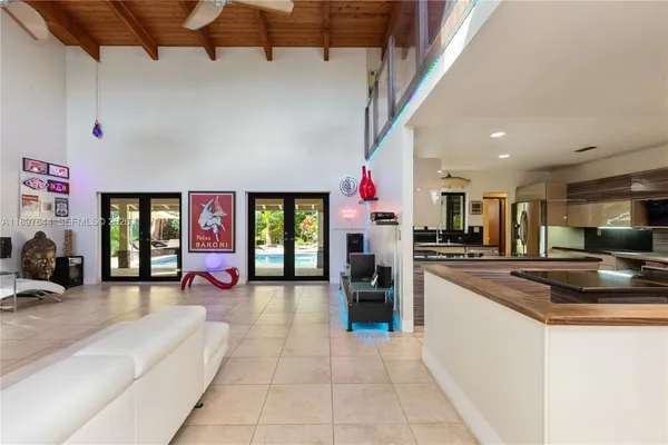 a view of swimming pool with chairs