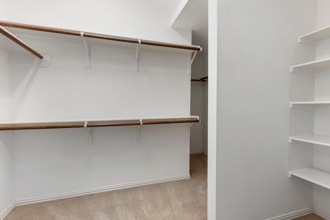 80 North Frontera Circle Spring, TX 77382 - Photo 17 of 28 a view of walk in closet with empty racks