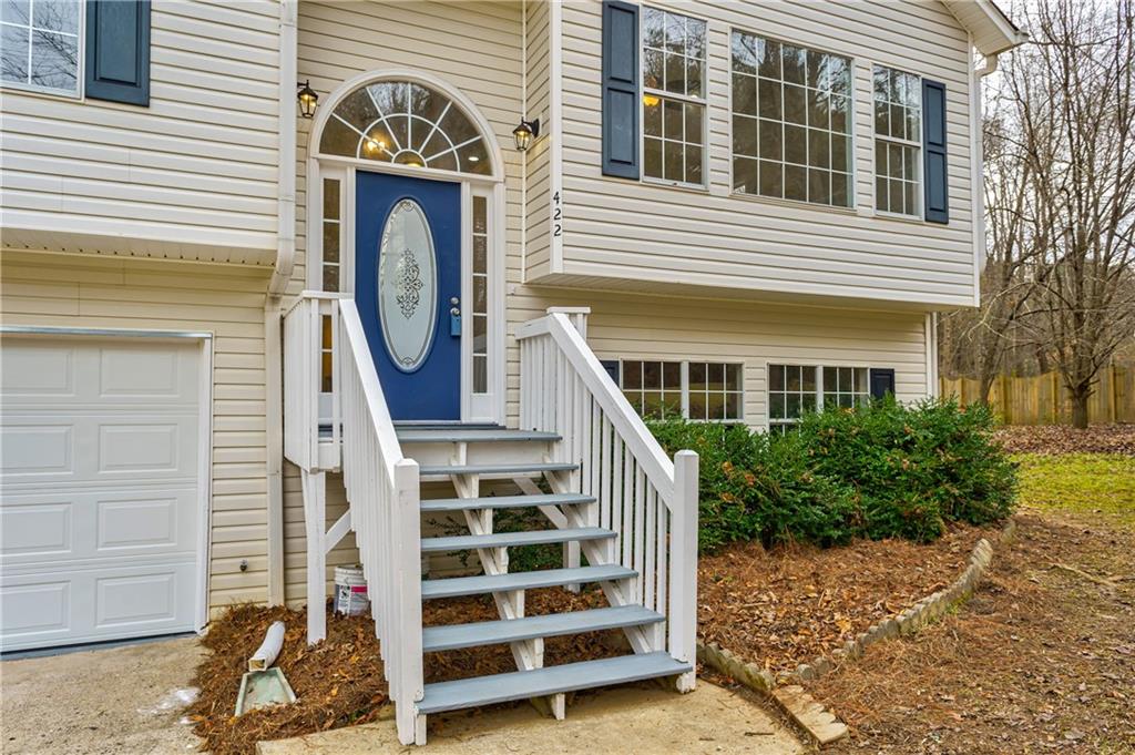 422 Bar J Road Temple, GA 30179 - Photo 1 of 1 a front view of a house with a yard