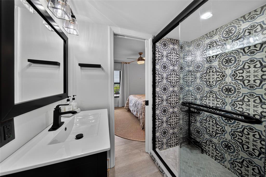 1629 Riverview Road, Unit 521 Deerfield Beach, FL 33441 - Photo 14 of 54 a bathroom with a sink and a mirror