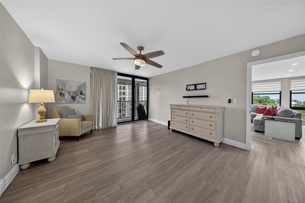 1629 Riverview Road, Unit 521 Deerfield Beach, FL 33441 - Photo 17 of 54 a living room with furniture and wooden floor
