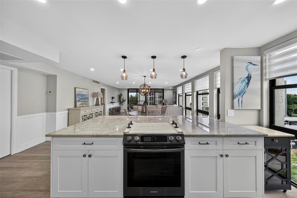 1629 Riverview Road, Unit 521 Deerfield Beach, FL 33441 - Photo 31 of 54 a kitchen with a stove and cabinets
