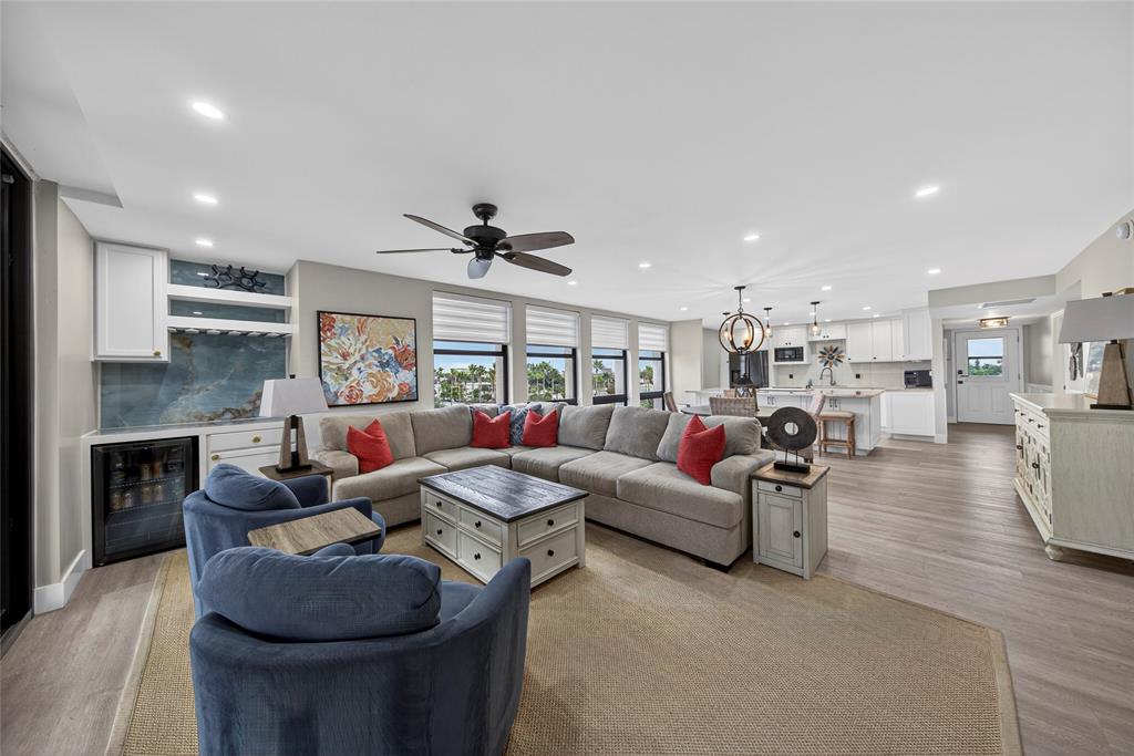 1629 Riverview Road, Unit 521 Deerfield Beach, FL 33441 - Photo 39 of 54 a living room with furniture and a fireplace