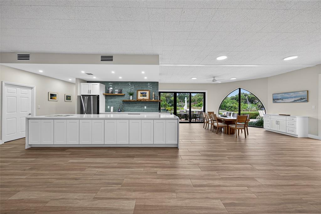 1629 Riverview Road, Unit 521 Deerfield Beach, FL 33441 - Photo 45 of 54 a living room with furniture and a large window