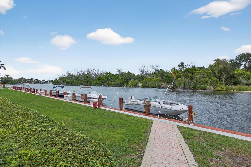 1629 Riverview Road, Unit 521 Deerfield Beach, FL 33441 - Photo 48 of 54 a view of a lake with outdoor space