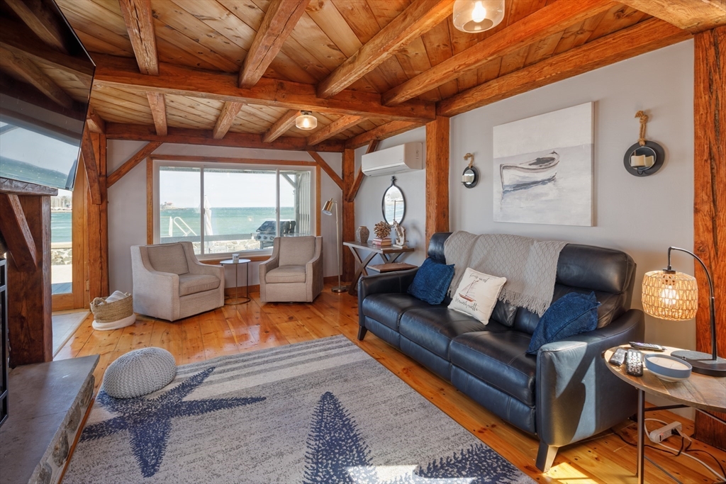 71 Willow Road Nahant, MA 01908 - Photo 12 of 30 a living room with furniture and a large window