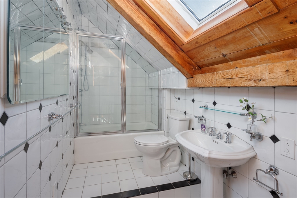 71 Willow Road Nahant, MA 01908 - Photo 30 of 30 a bathroom with a sink toilet and shower
