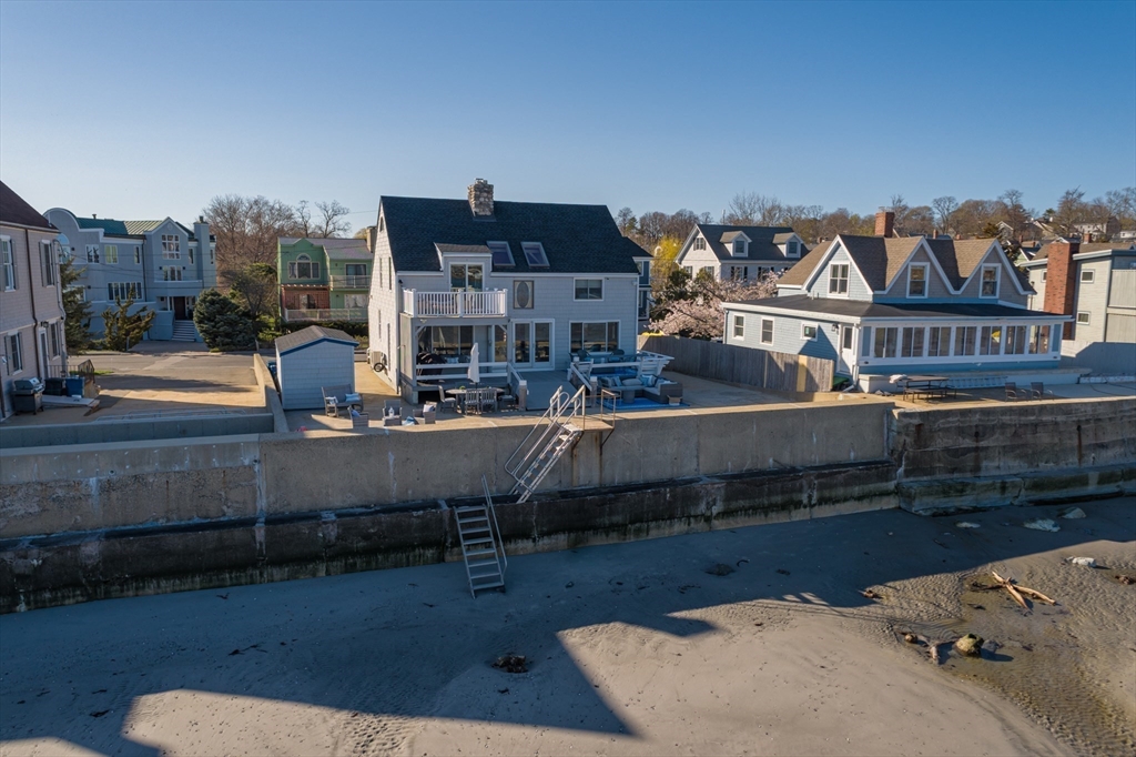 71 Willow Road Nahant, MA 01908 - Photo 5 of 30 a view of a city with tall buildings