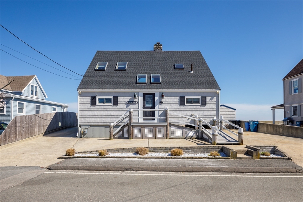 71 Willow Road Nahant, MA 01908 - Photo 9 of 30 a front view of a house with a view of living room