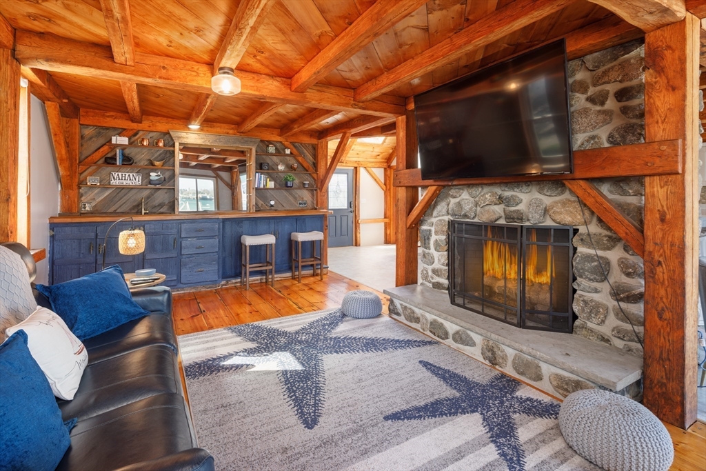 71 Willow Road Nahant, MA 01908 - Photo 10 of 30 a living room with furniture and a fireplace