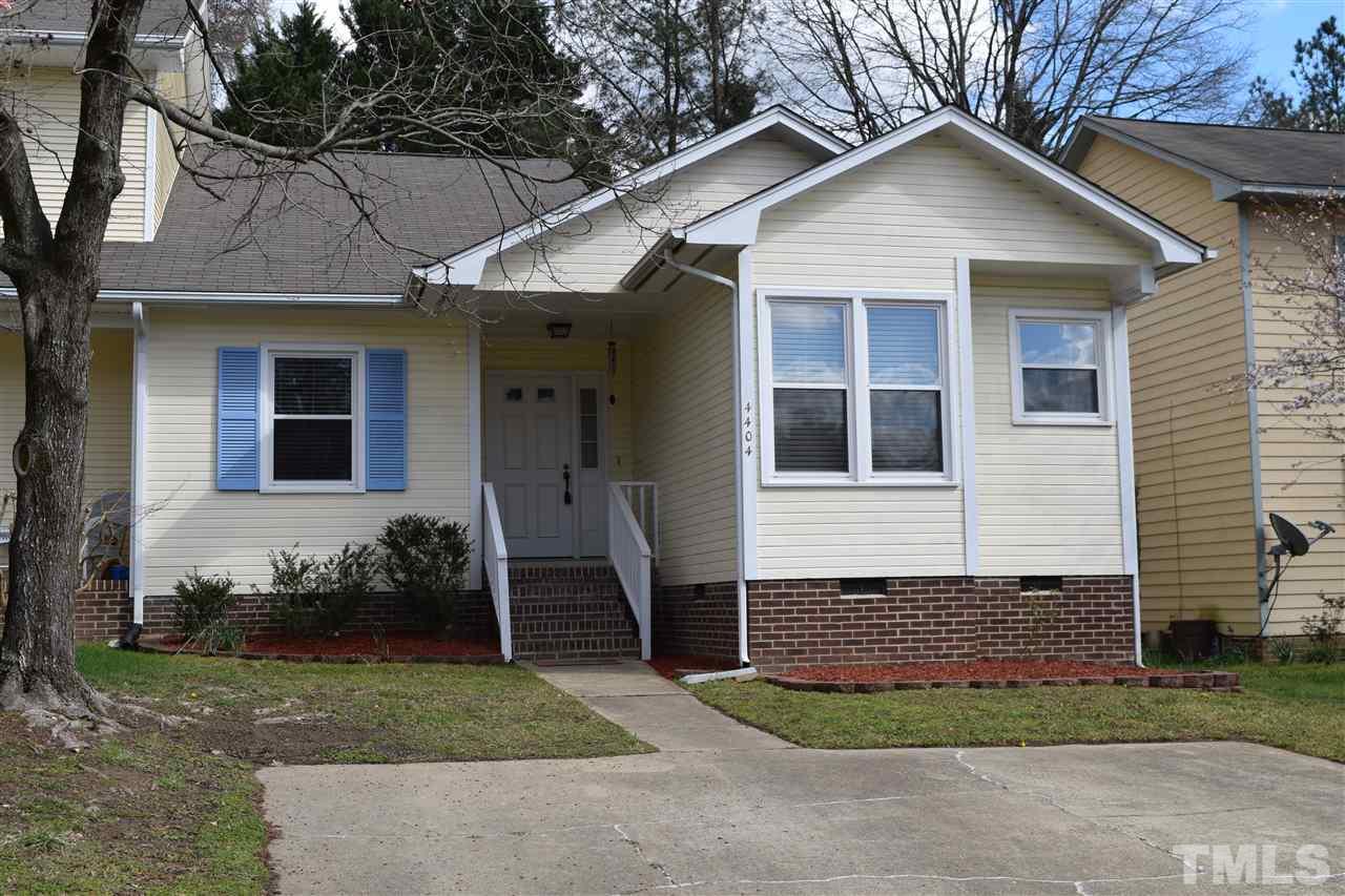 4404 Lake Ridge Drive Raleigh, NC 27604 - Photo 2 of 24 a front view of a house with a yard
