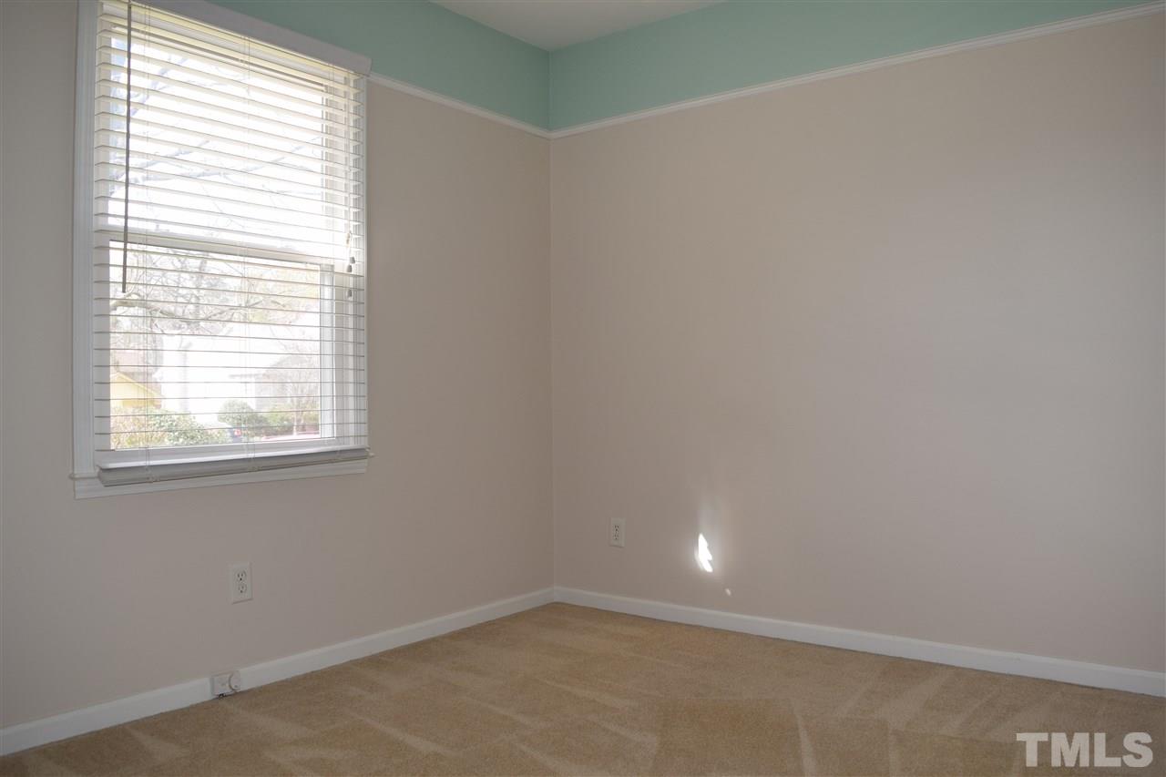 4404 Lake Ridge Drive Raleigh, NC 27604 - Photo 23 of 24 an empty room with a window