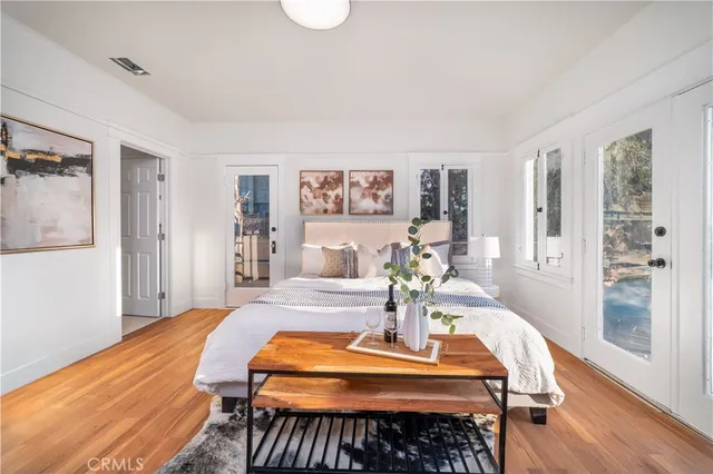 a room with furniture and wooden floor