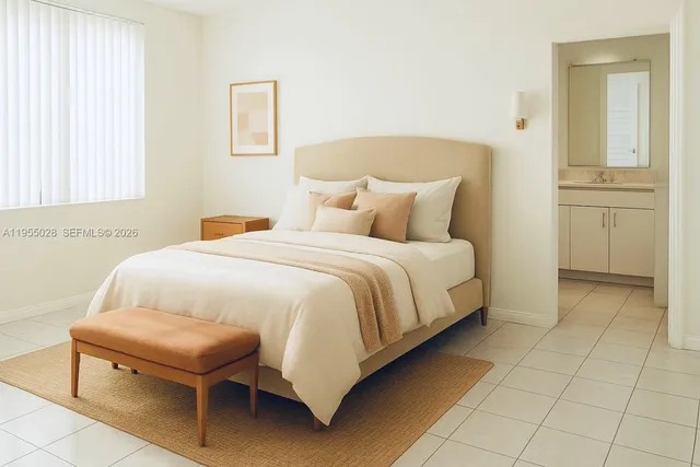 a bedroom with a bed and a table in it