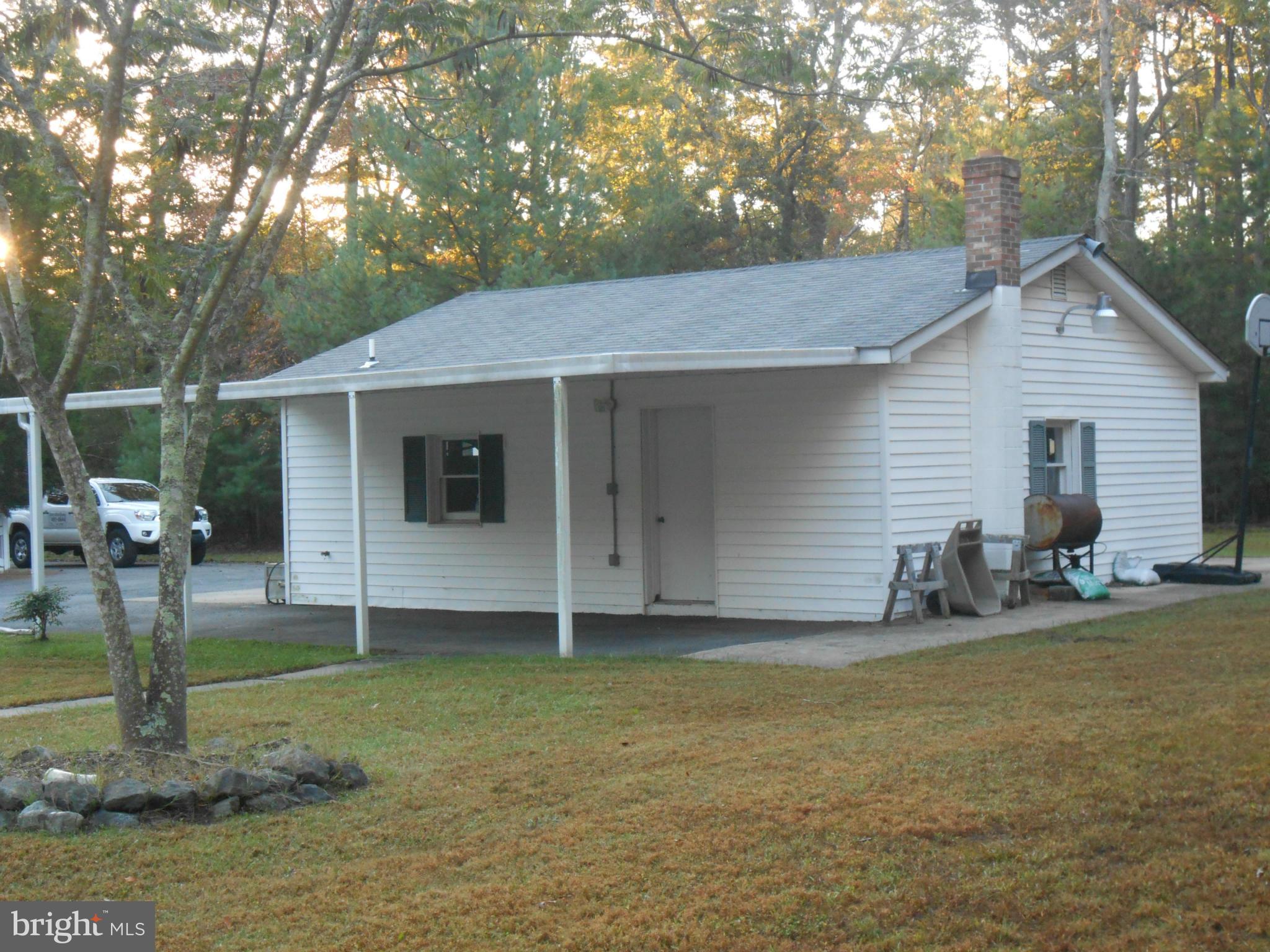 18111 Three Notch Road Lexington Park, MD 20653 - Photo 15 of 23 a view of a house with backyard and garden
