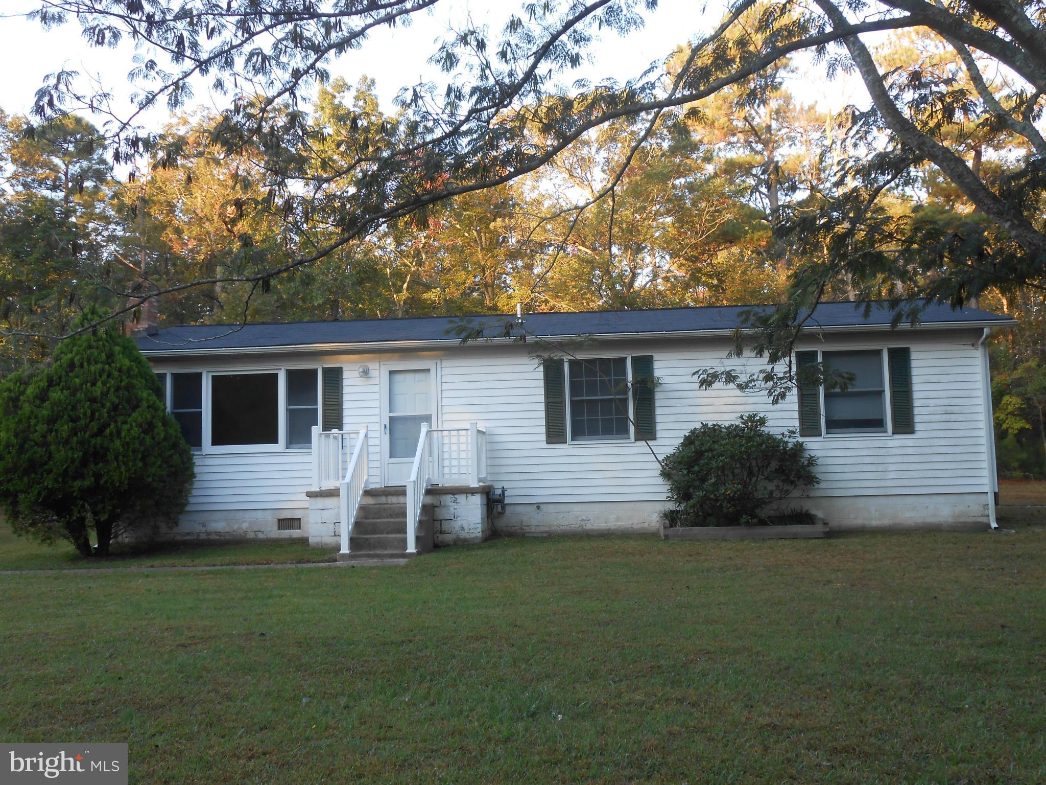 18111 Three Notch Road Lexington Park, MD 20653 - Photo 22 of 23 a house view with a garden space
