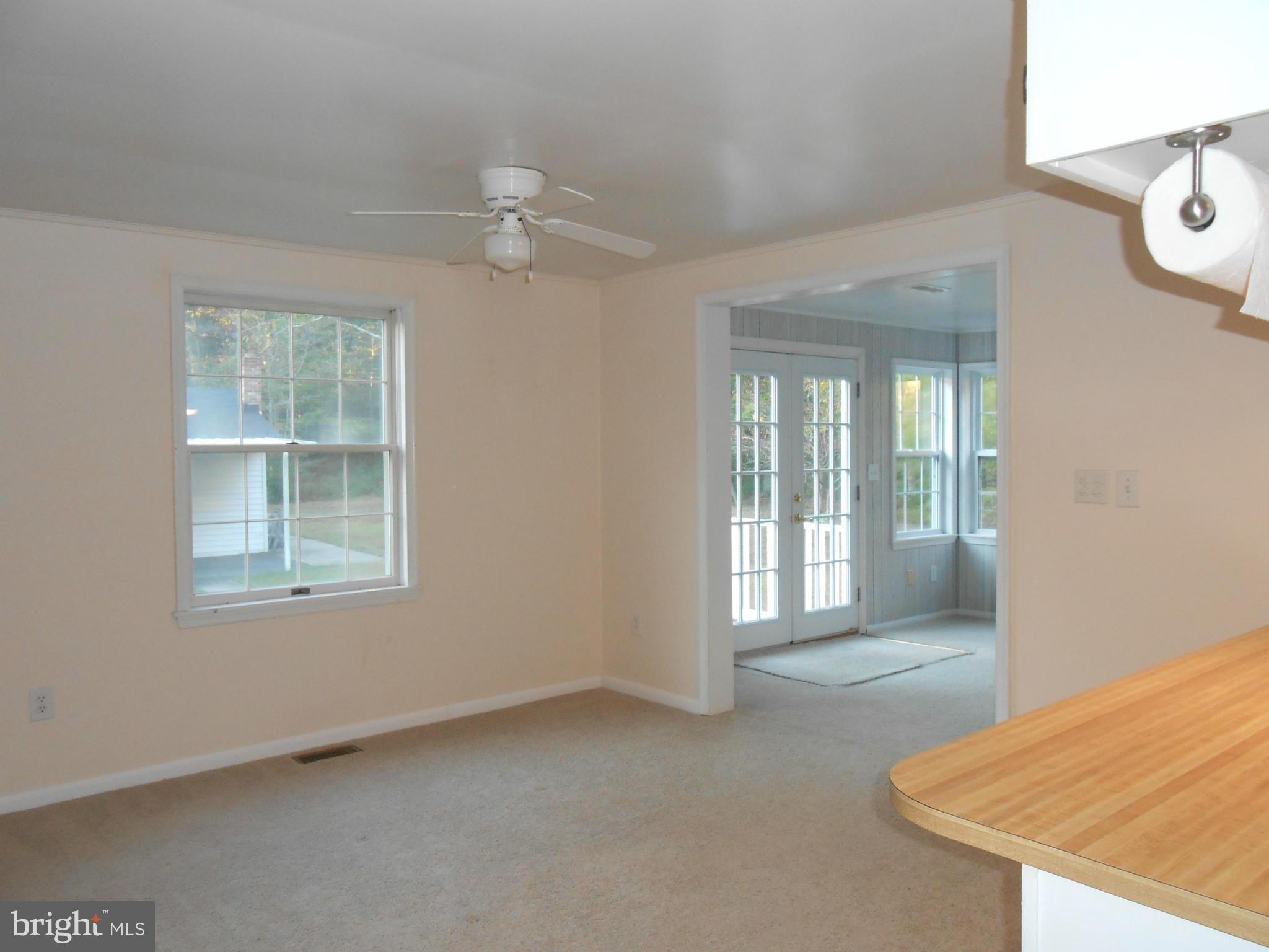 18111 Three Notch Road Lexington Park, MD 20653 - Photo 5 of 23 an empty room with windows
