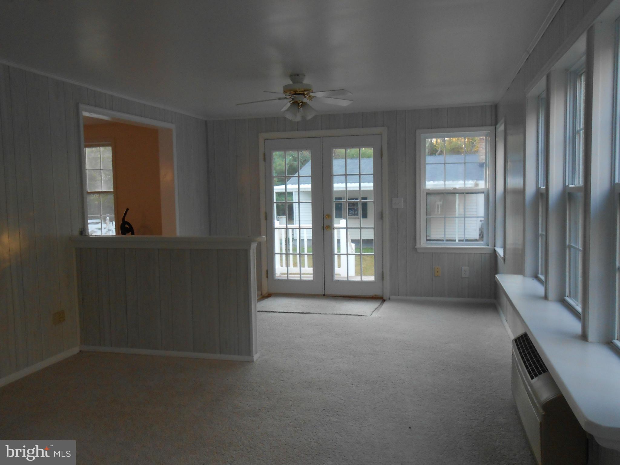 18111 Three Notch Road Lexington Park, MD 20653 - Photo 6 of 23 an empty room with windows