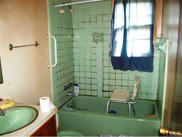 Bath ceramic tile damage.