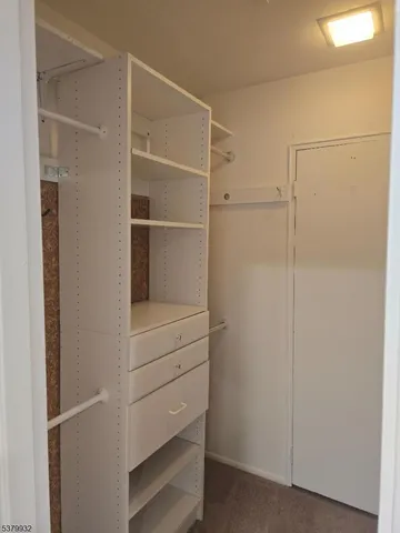 a bathroom with a toilet a sink and bathtub