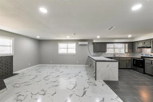 a view of kitchen and sink