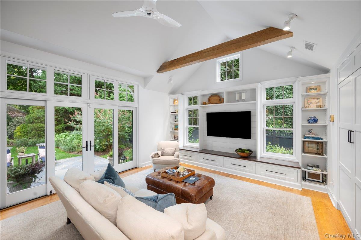 33 Pryer Lane Larchmont, NY 10538 - Photo 15 of 37 a living room with furniture and a flat screen tv