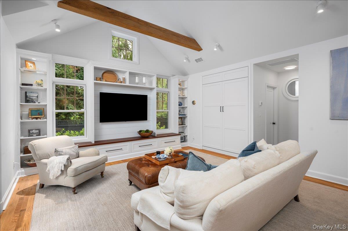 33 Pryer Lane Larchmont, NY 10538 - Photo 16 of 37 a living room with furniture and a flat screen tv