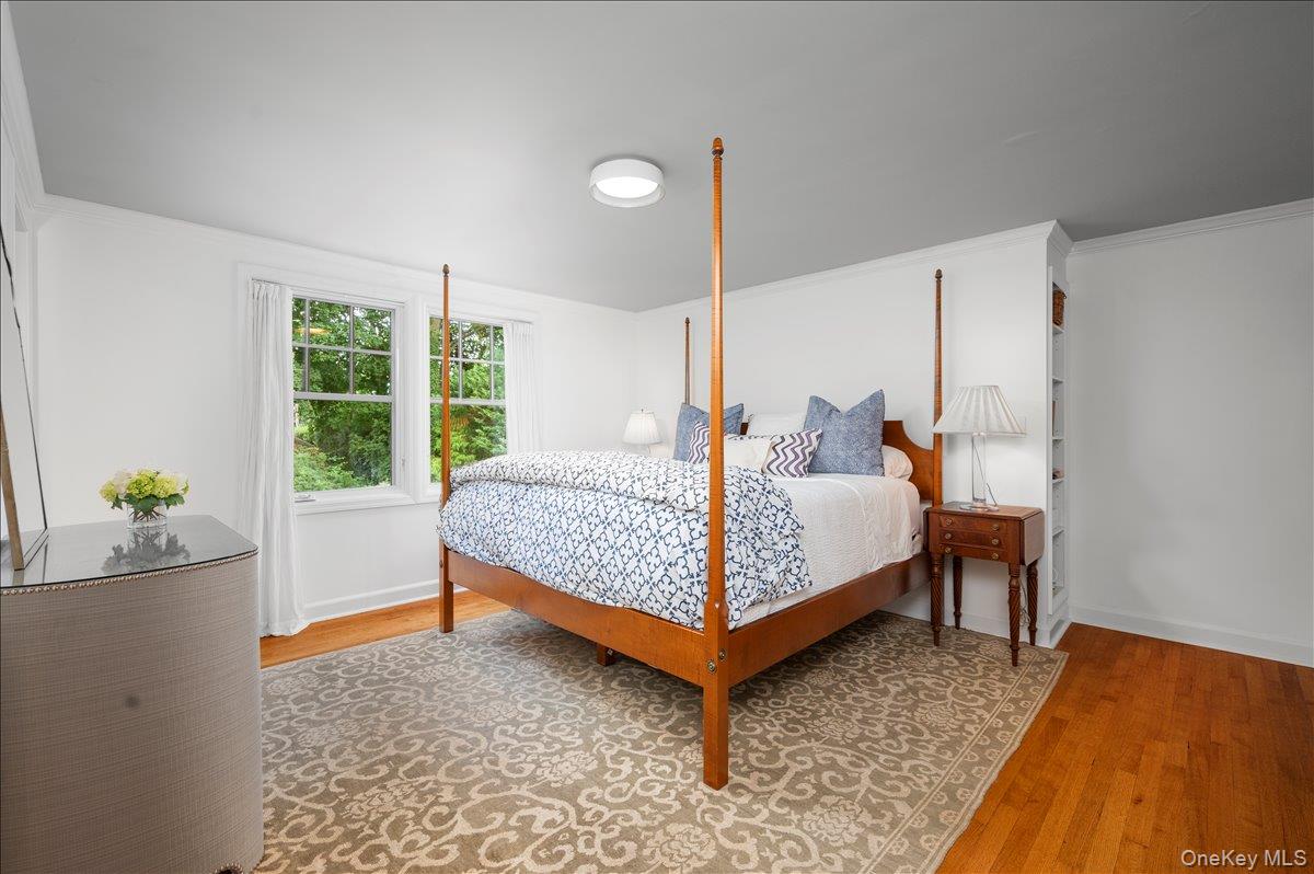 33 Pryer Lane Larchmont, NY 10538 - Photo 19 of 37 a bedroom with a bed and window