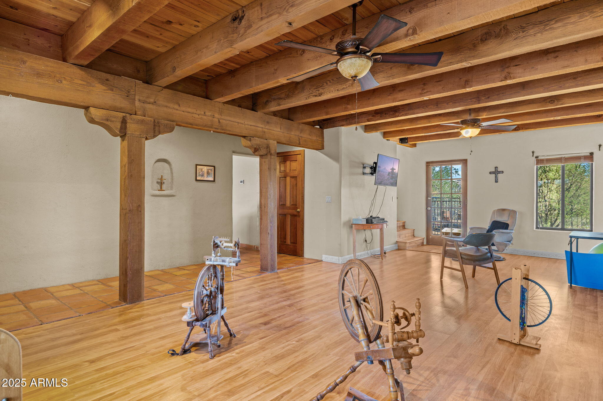 6319 East Lowden Road Cave Creek, AZ 85331 - Photo 15 of 52 a room with lots of wooden furniture