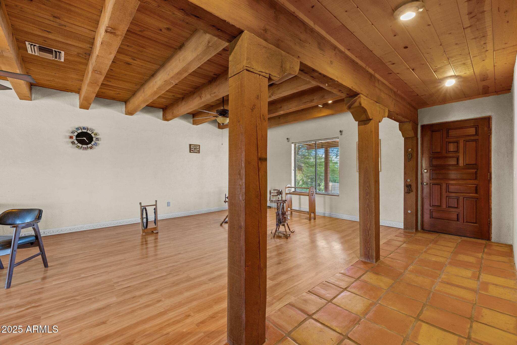 6319 East Lowden Road Cave Creek, AZ 85331 - Photo 17 of 52 a view of a hallway with wooden floor