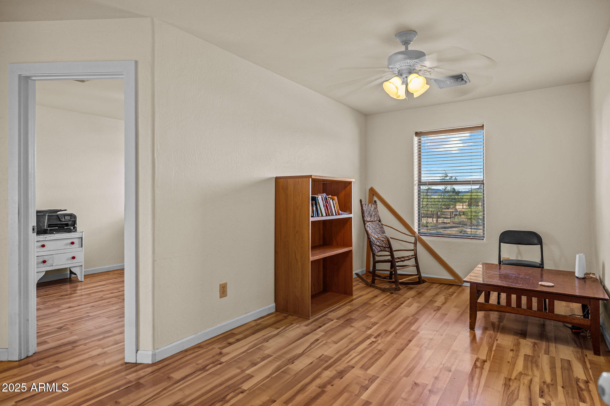 6319 East Lowden Road Cave Creek, AZ 85331 - Photo 35 of 52 a view of a livingroom with wooden floor and furniture
