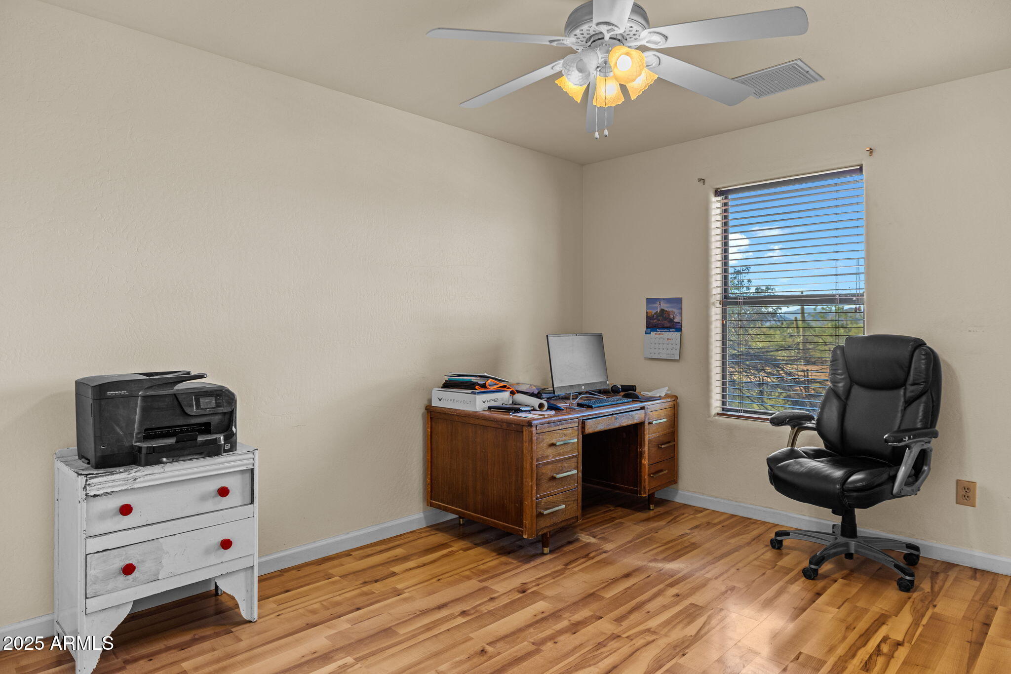 6319 East Lowden Road Cave Creek, AZ 85331 - Photo 37 of 52 a living room with furniture and a window