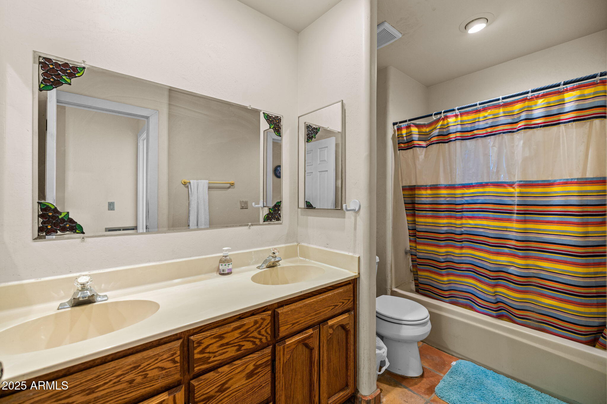 6319 East Lowden Road Cave Creek, AZ 85331 - Photo 40 of 52 a bathroom with a sink a toilet and shower